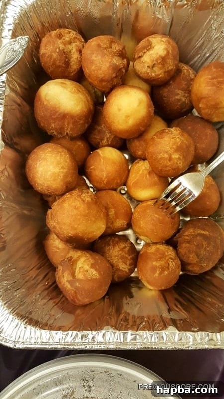 Meeting Update 9 Pile of Cameroonian gateau, golden-brown, sweet, and addictively delicious