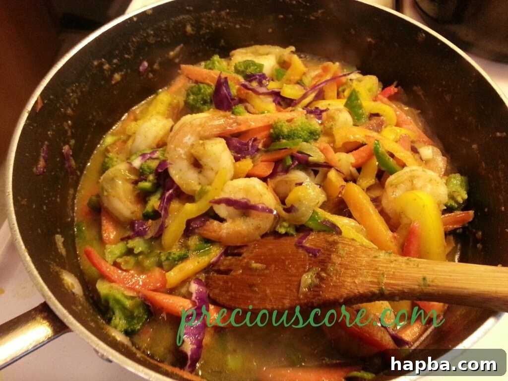 The finished shrimp and vegetable stir-fry in the pan.