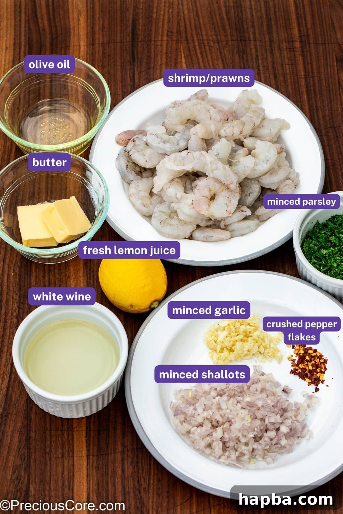 All the crucial ingredients for making Shrimp In White Wine Sauce, neatly laid out with labels.