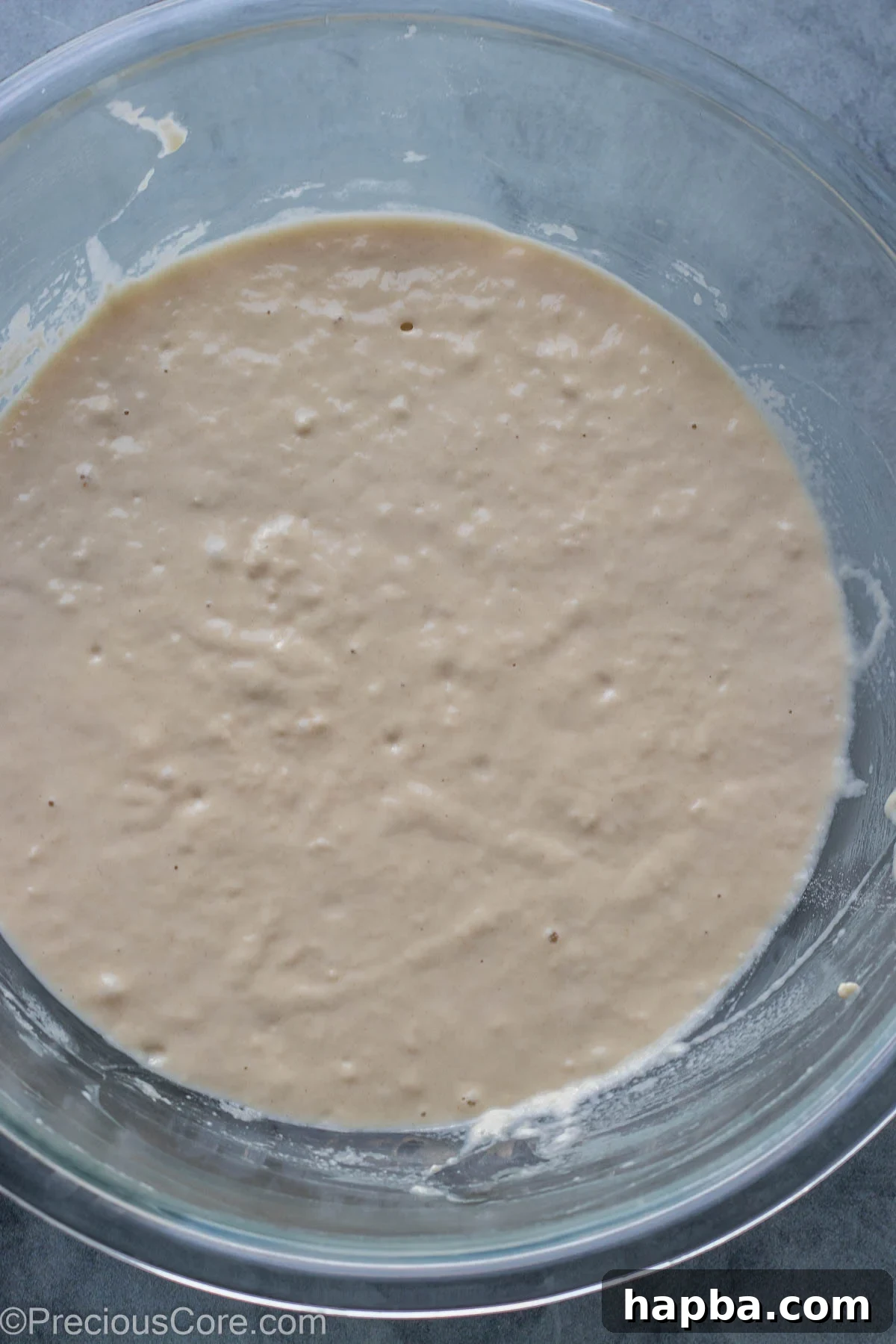 Puff Puff batter in a bowl after mixing, before rising.