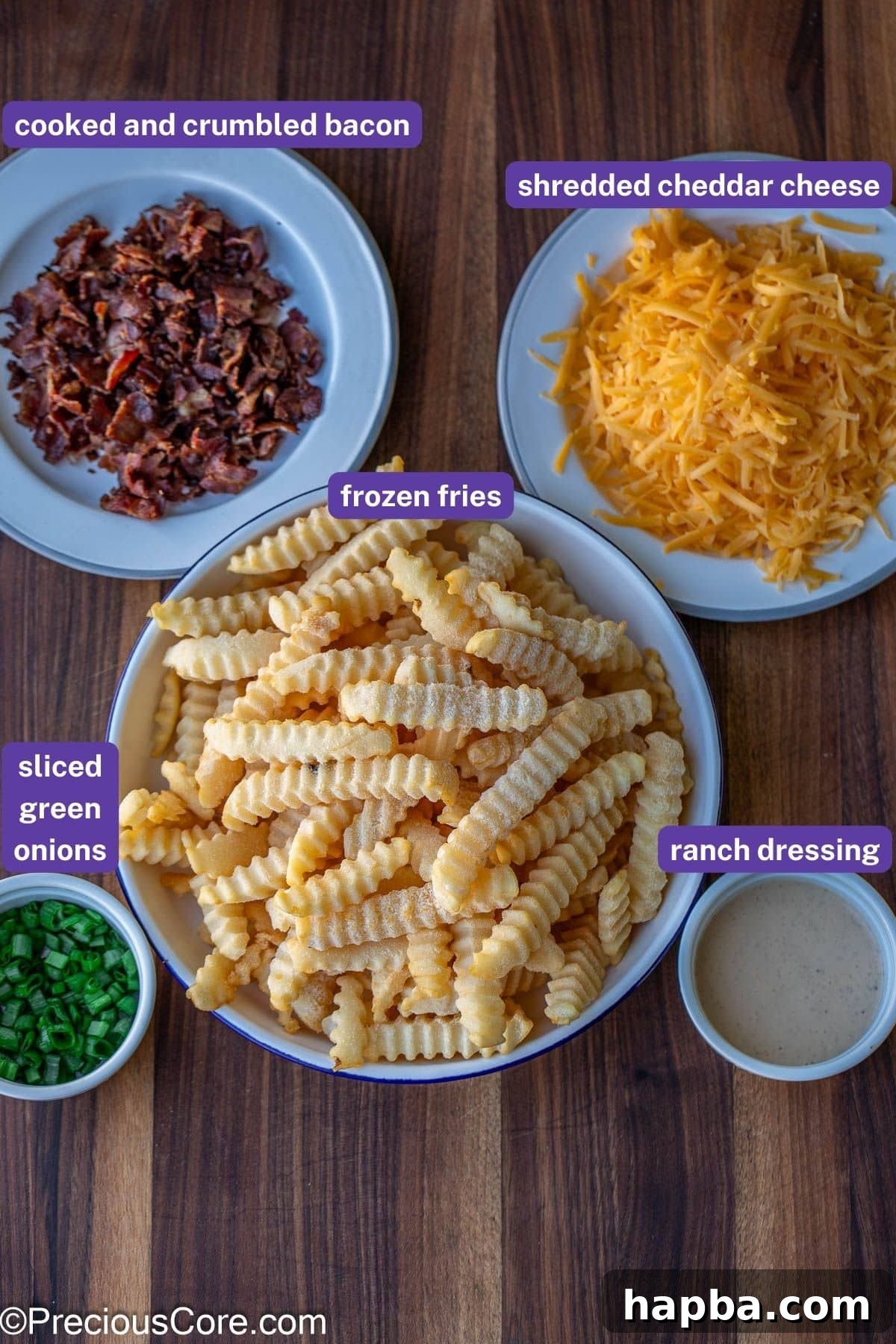 All the necessary ingredients for loaded fries, clearly labeled for convenience.