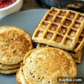 A charming serving plate adorned with both plantain pancakes and complementary plantain waffles, highlighting their golden appearance.