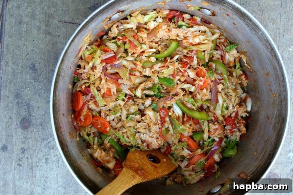 A hearty serving of stewed cabbage and Irish potatoes, a classic Cameroonian dish.