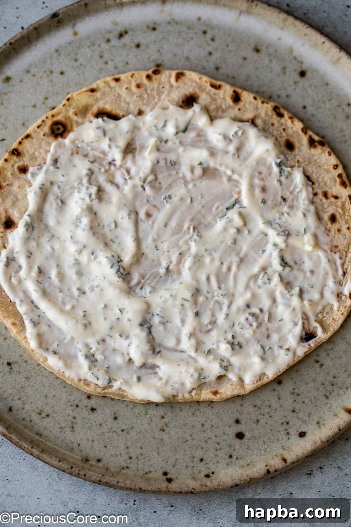 Shawarma sauce on flatbread.
