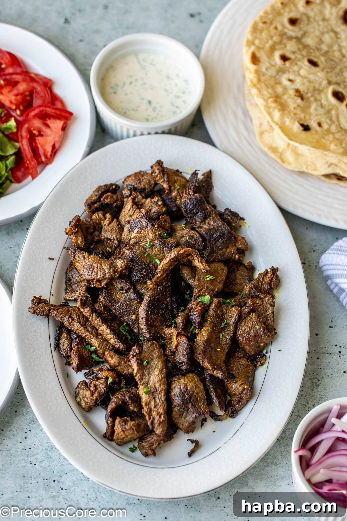 Restaurant-Style Beef Shawarma at Home 2 Beef shawarma on a platter, ready to be served.