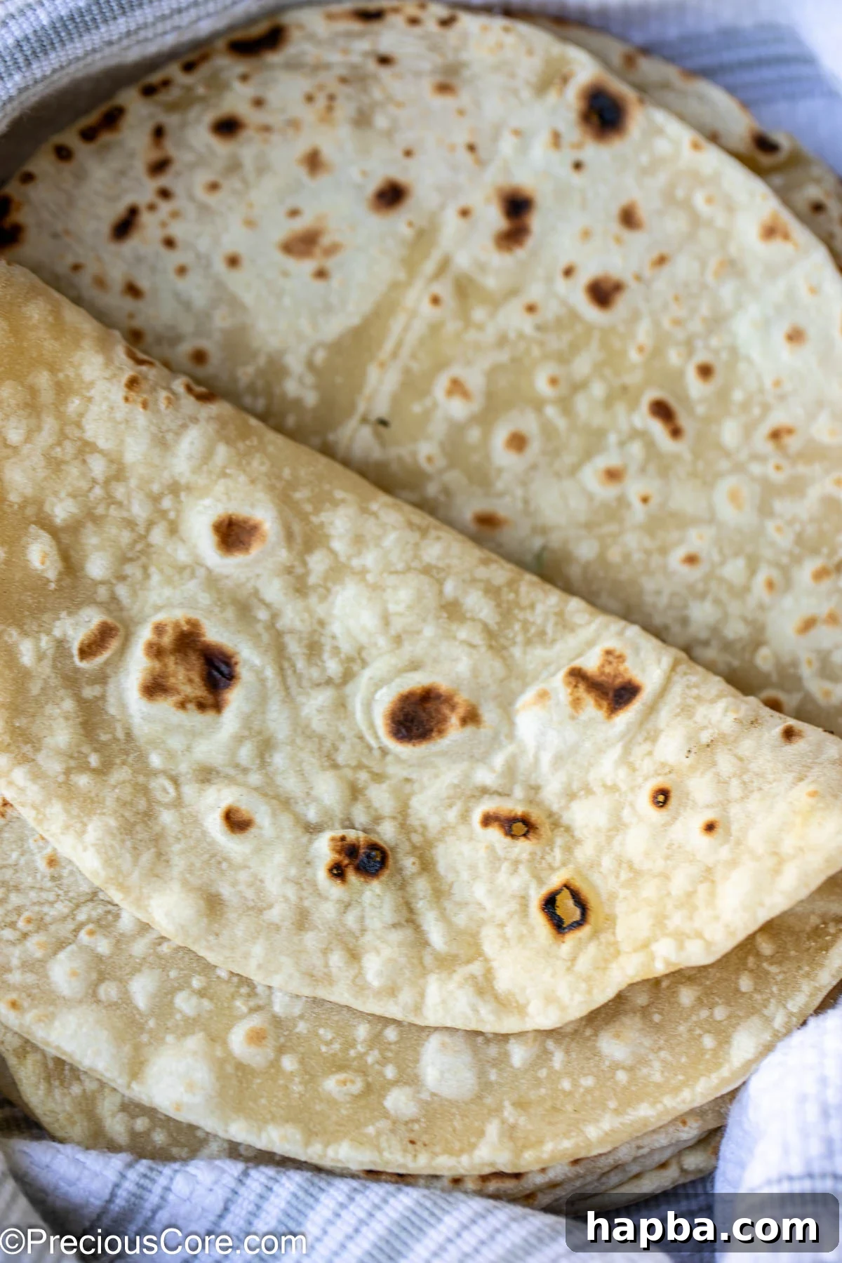 Shawarma Flatbread 3 A perfectly folded piece of homemade shawarma bread, showcasing its flexibility and readiness for filling.