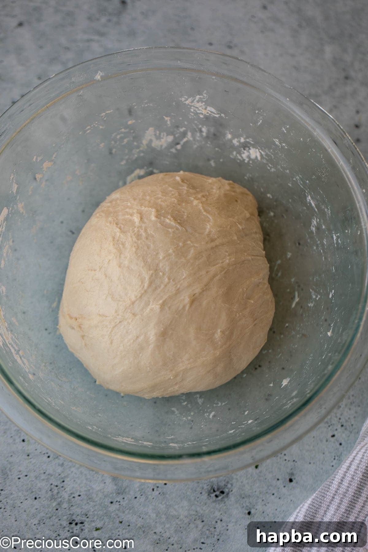 Shawarma Flatbread 7 Smooth, well-rested bread dough in a glass bowl, ready for the next stage of preparation.