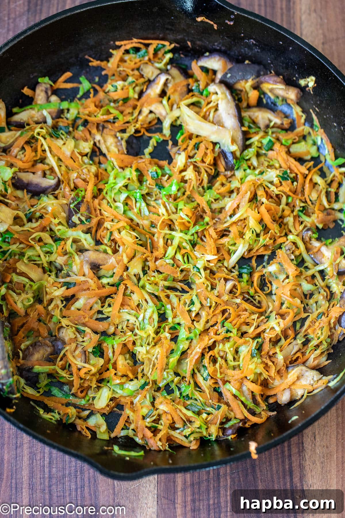 Cooking vegetables in a skillet.