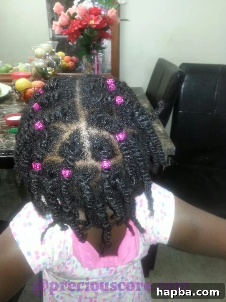 Girl one with natural hair twists and antique accessories