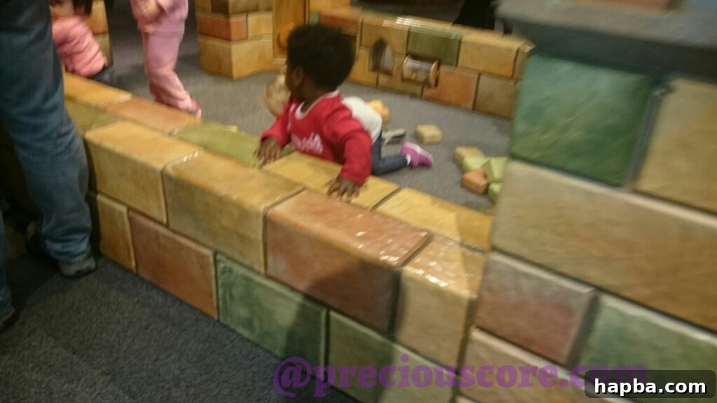 Children playing at an interactive museum exhibit