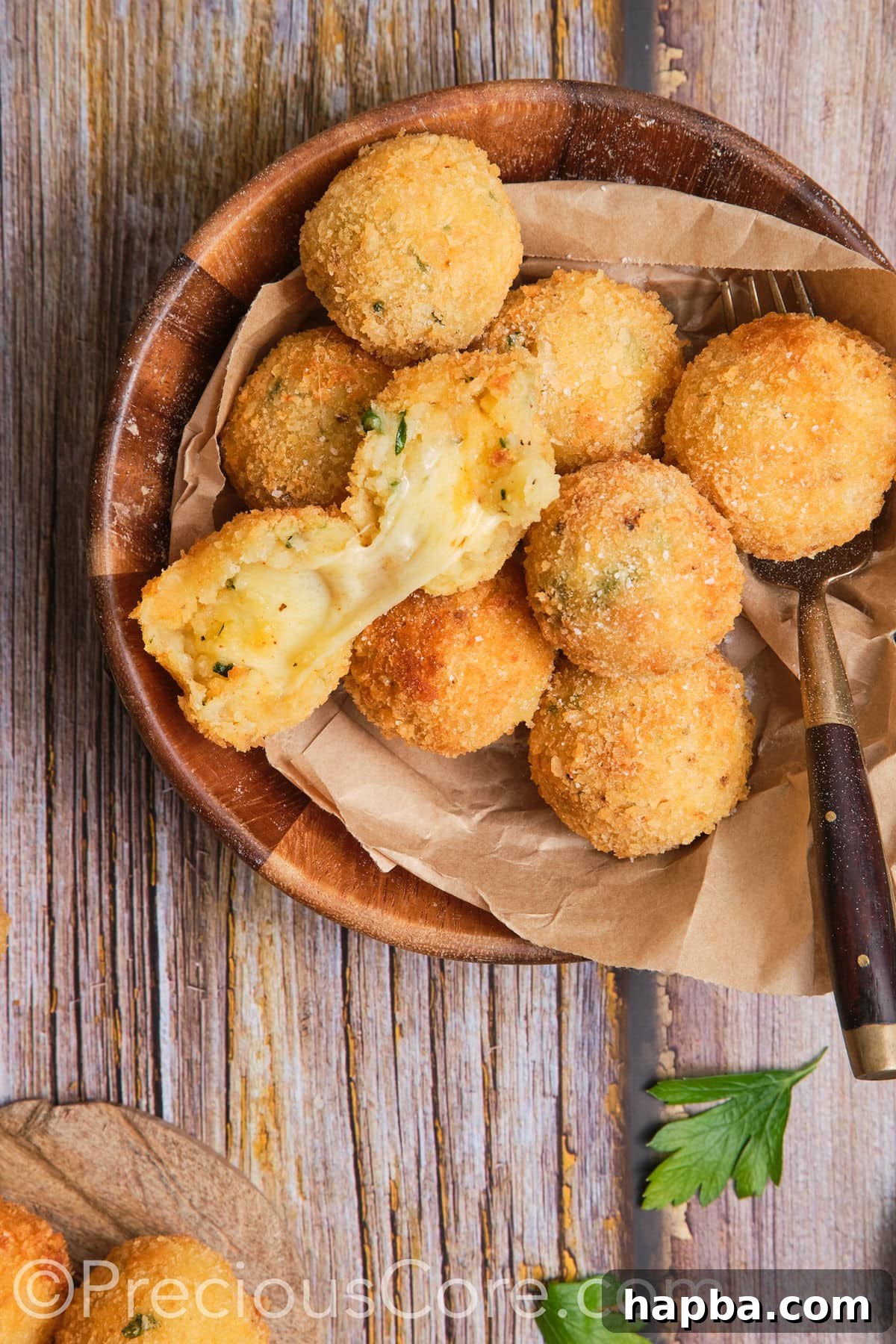 Cheese potato balls in a wooden bowl.