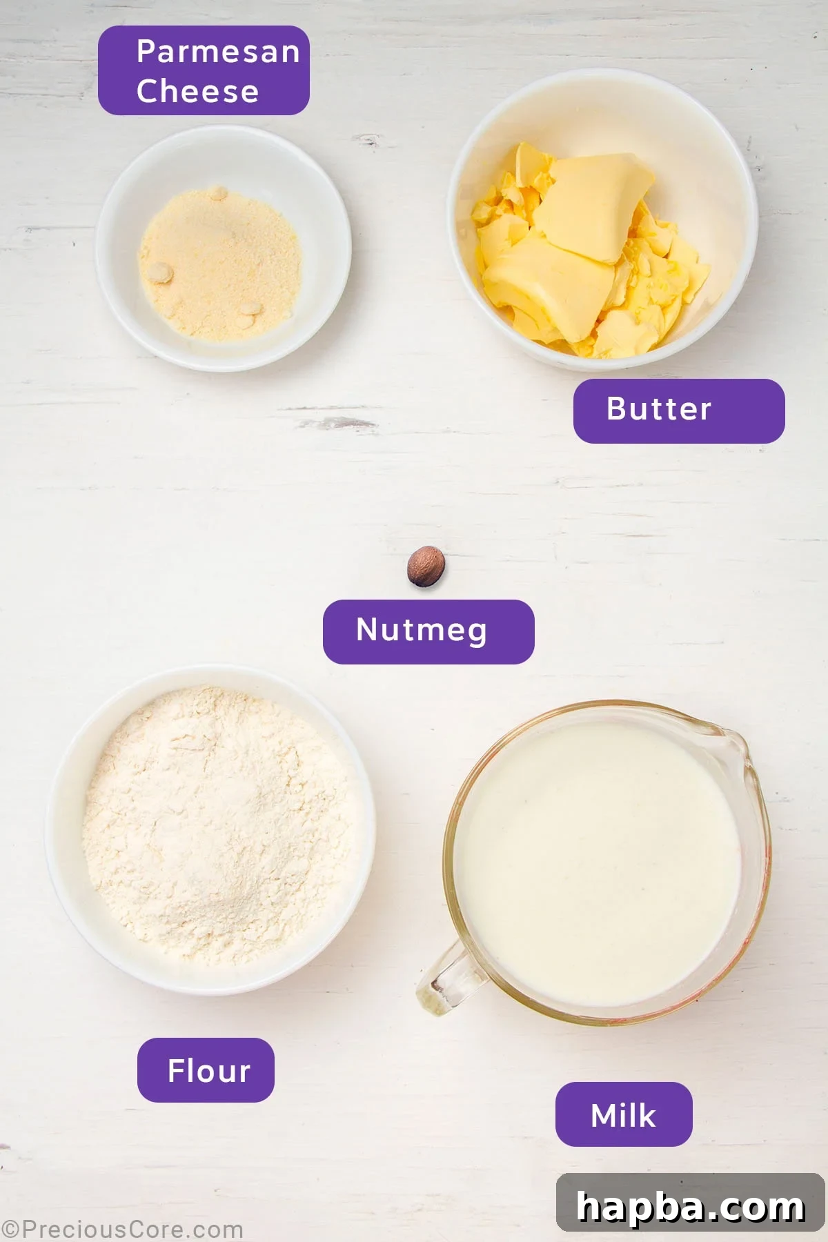 Creamy Béchamel Lasagna 4 Arrangement of ingredients for homemade béchamel sauce: butter, flour, whole milk, nutmeg, and Parmesan cheese.