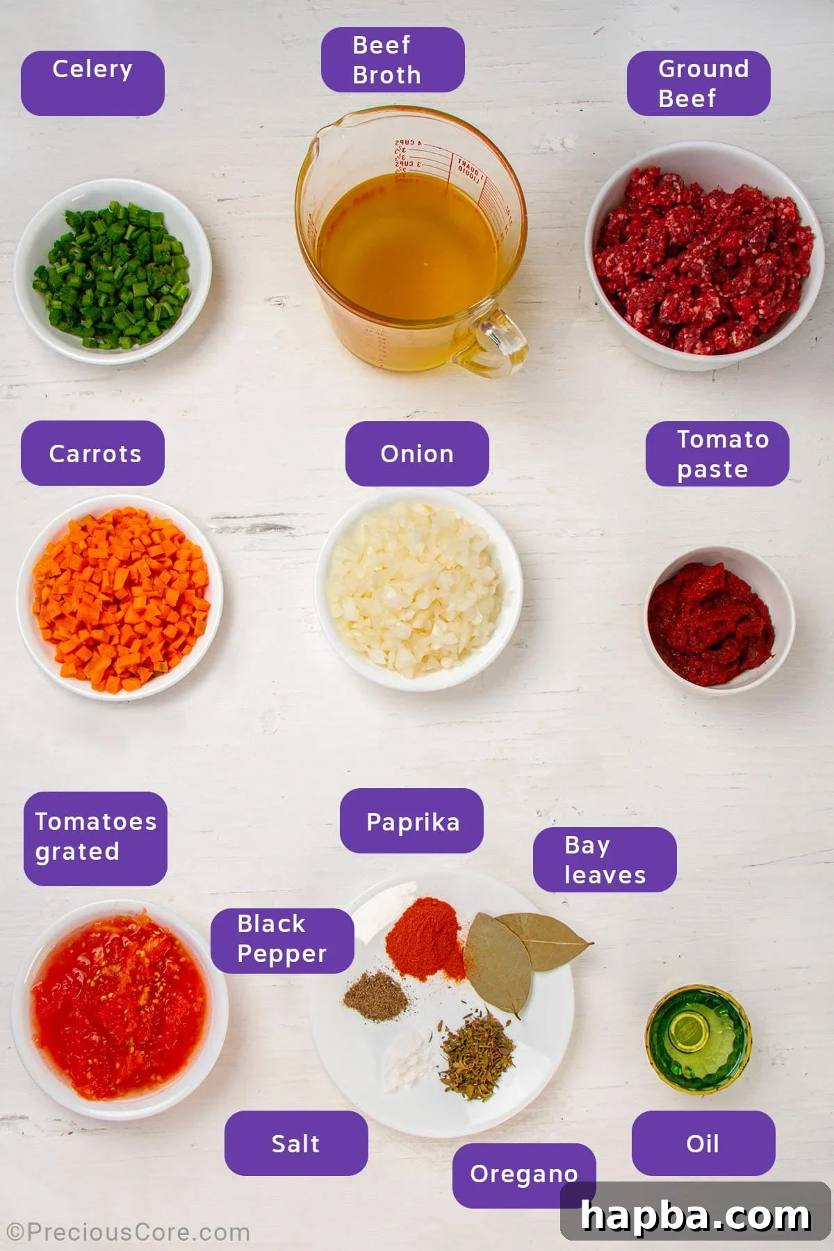 Creamy Béchamel Lasagna 5 Array of fresh and pantry ingredients for a classic Bolognese sauce: ground beef, carrots, celery, onions, tomatoes, tomato paste, beef broth, bay leaves, and spices.