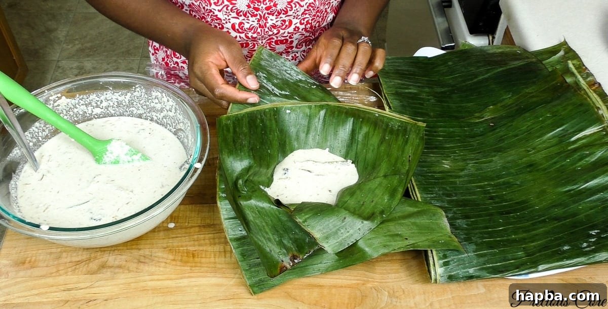 Arranging egusi pudding bundles in a pot for steaming