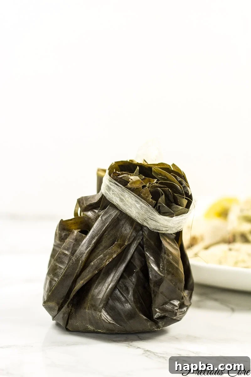 Freshly prepared Egusi Pudding wrapped in leaves