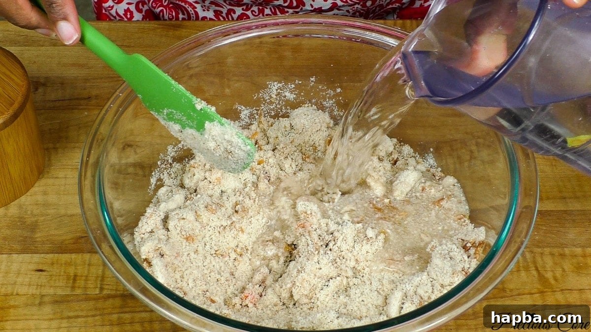 Mixing egusi with spices and water