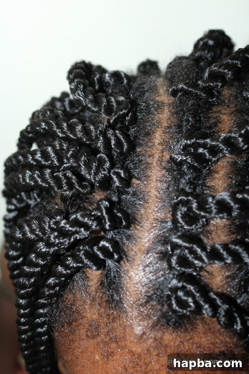 Close-up of crochet braids, showing the natural texture once released