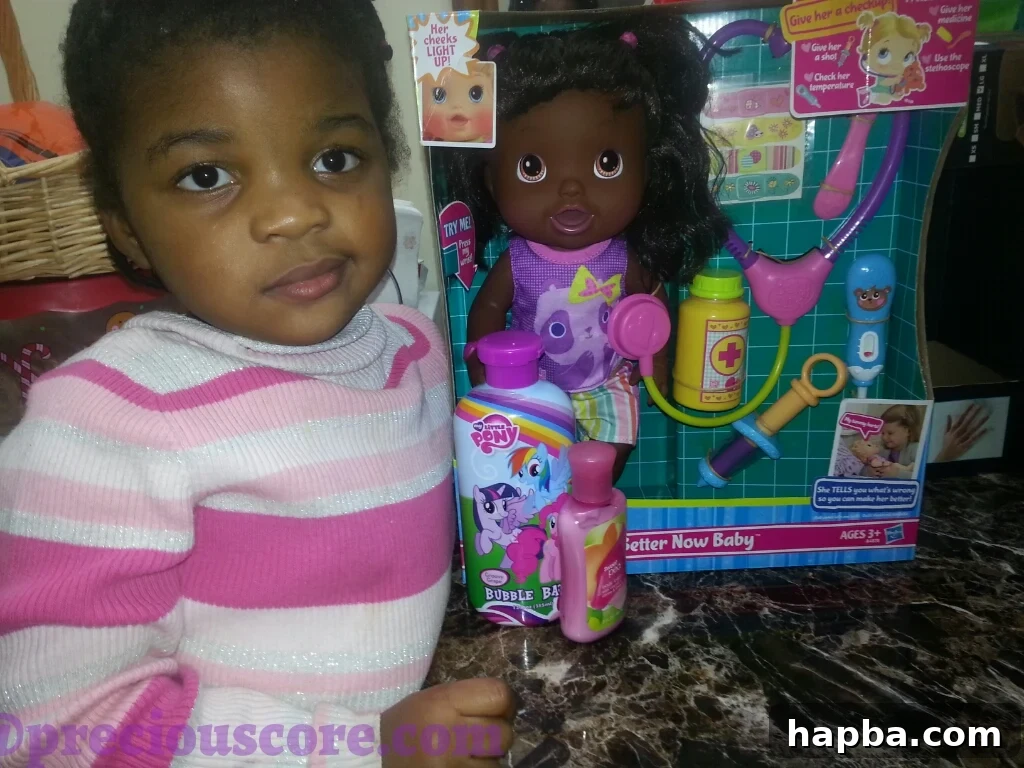 A new doll, bringing joy to a child.