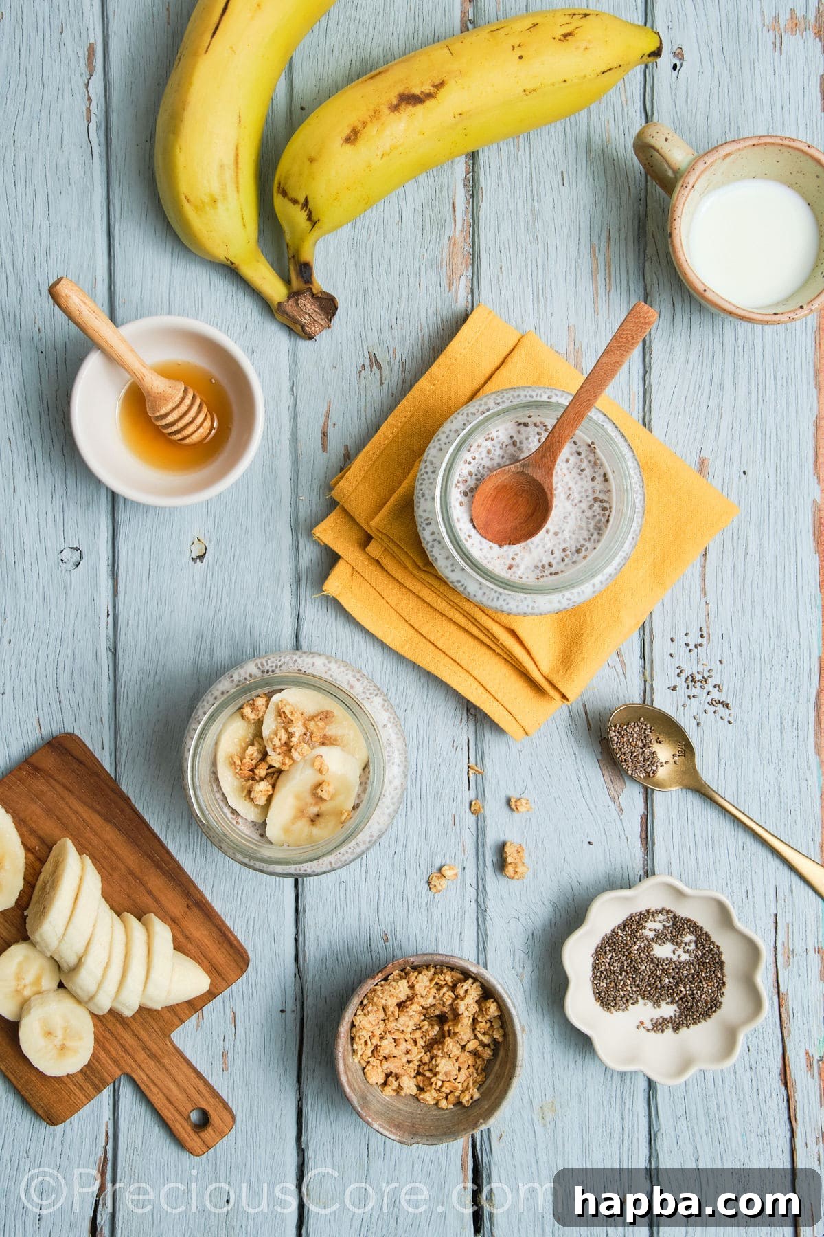 Banana chia seed pudding beautifully topped with fresh banana slices and crunchy walnuts.
