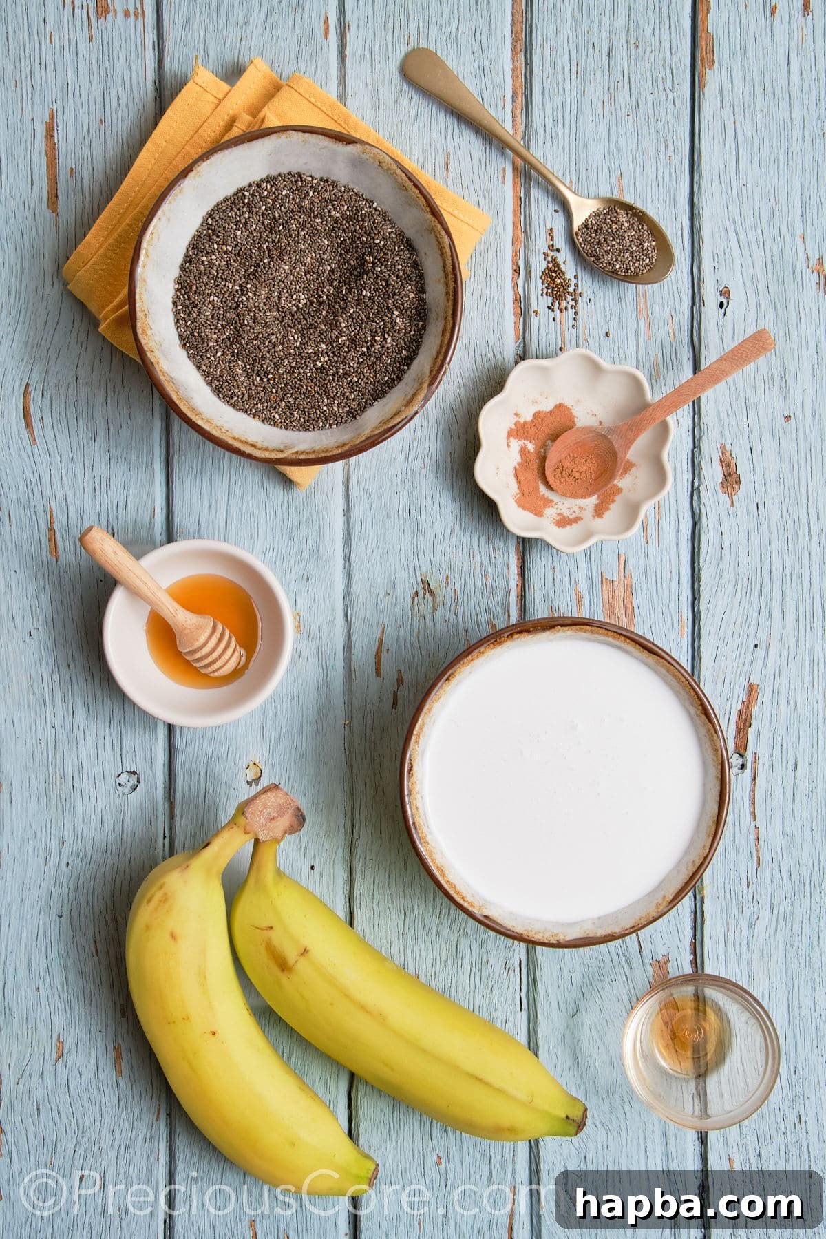A vibrant flat lay showcasing all the fresh and wholesome ingredients needed for Banana Chia Seed Pudding.