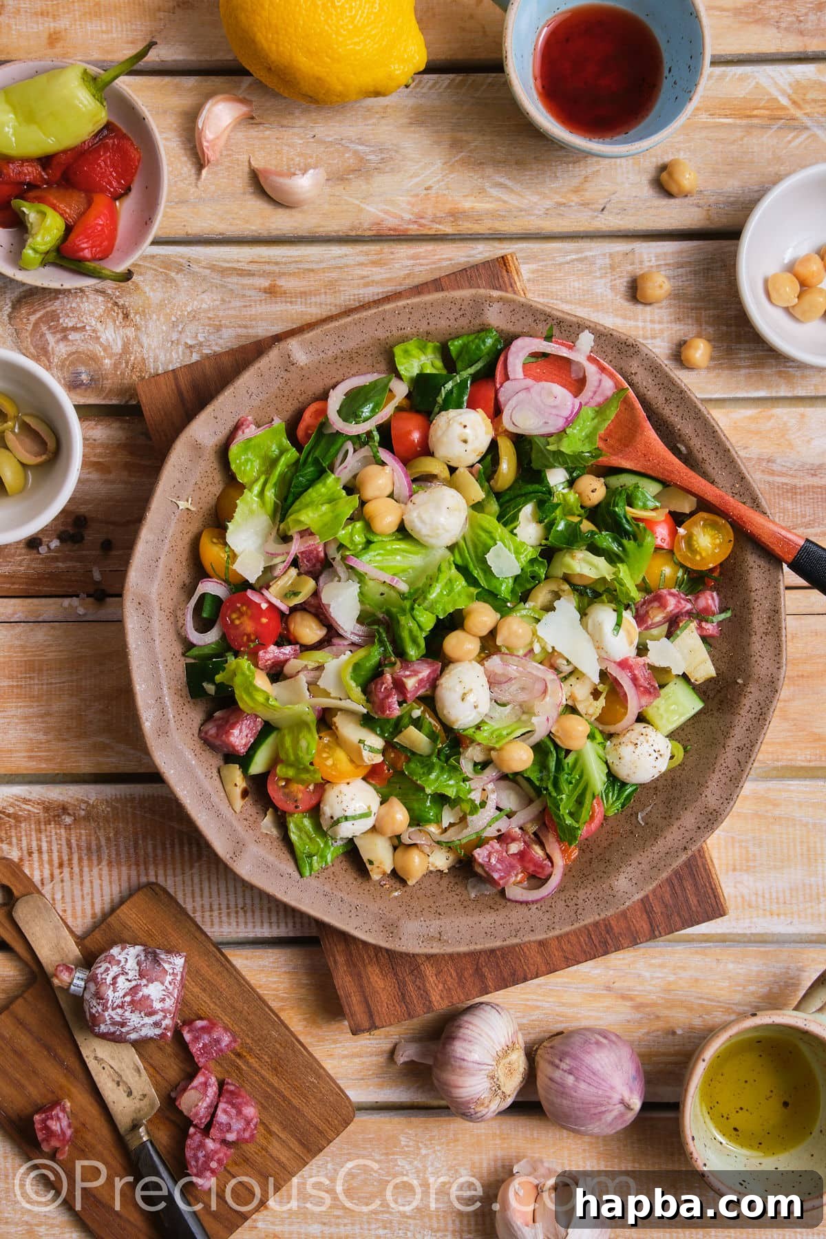 A vibrant chopped salad served in a stylish brown bowl, ready to be enjoyed.
