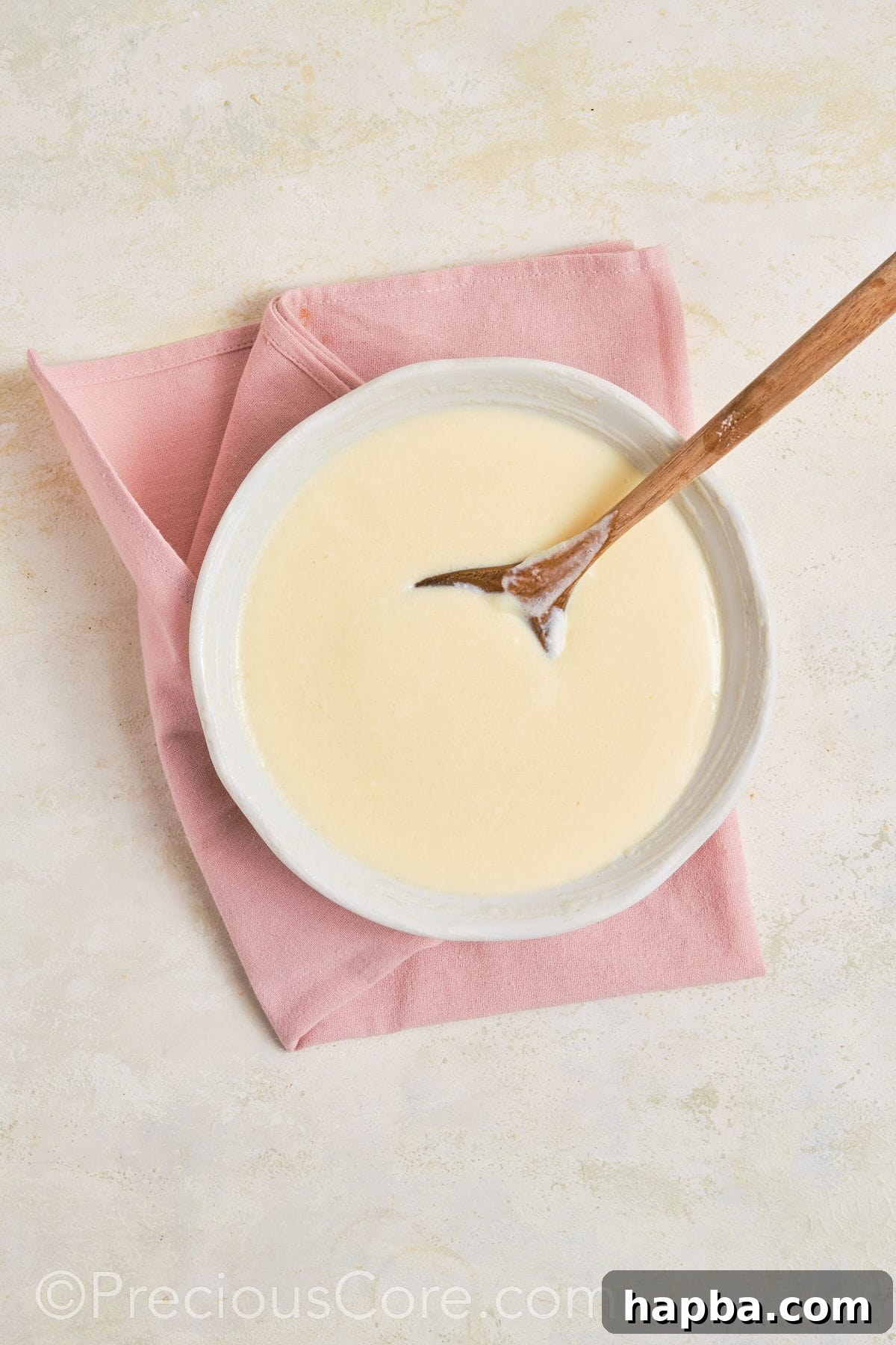 Mixing banana pudding mix.