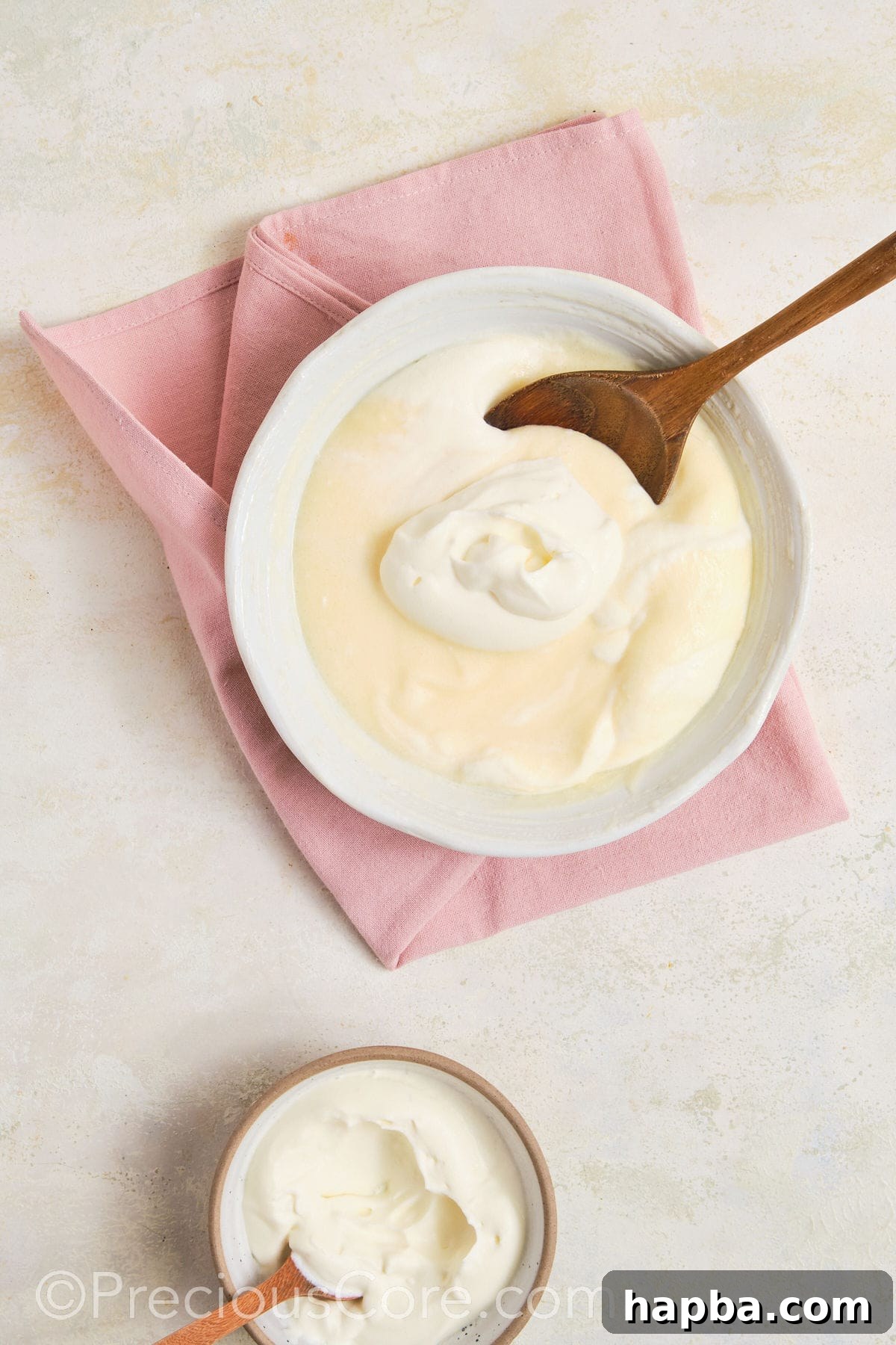 Folding whipped topping into banana pudding mix.