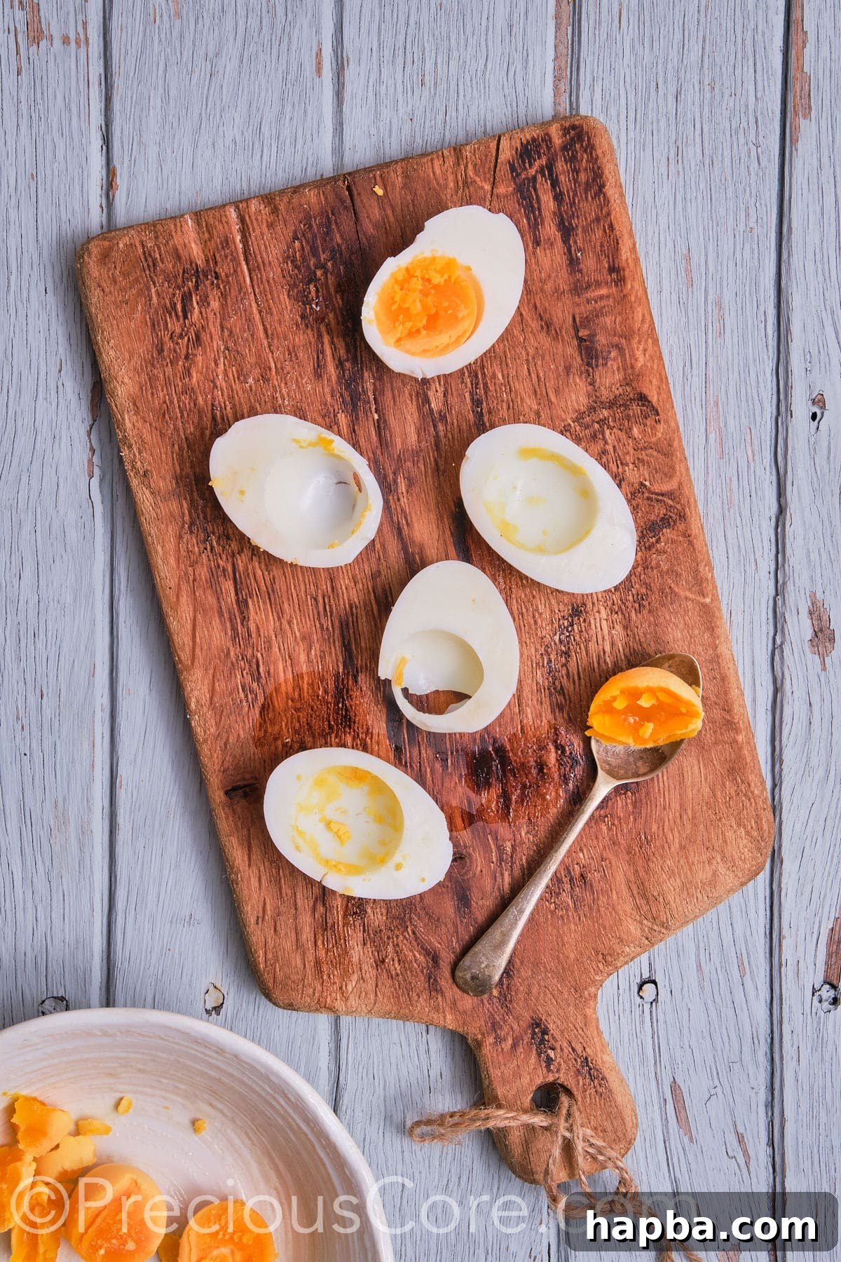 Kickin' Cajun Shrimp Deviled Eggs 11 egg yolk scooped out.
