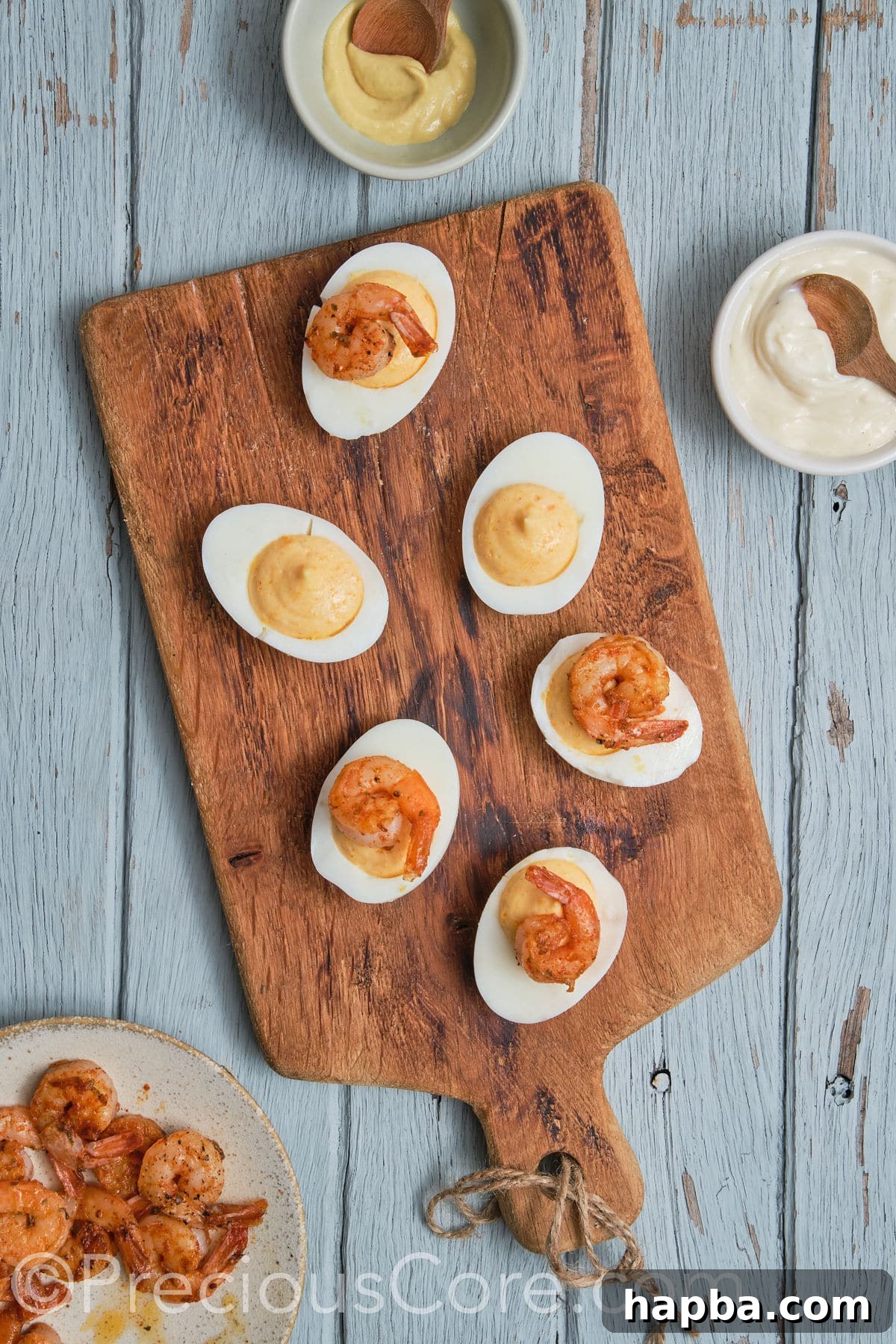 Kickin' Cajun Shrimp Deviled Eggs 21 devilled eggs topped with shrimp.