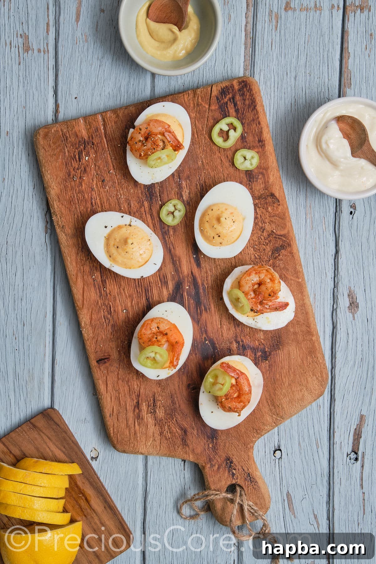 Kickin' Cajun Shrimp Deviled Eggs 22 devilled eggs topped with jalapeno.