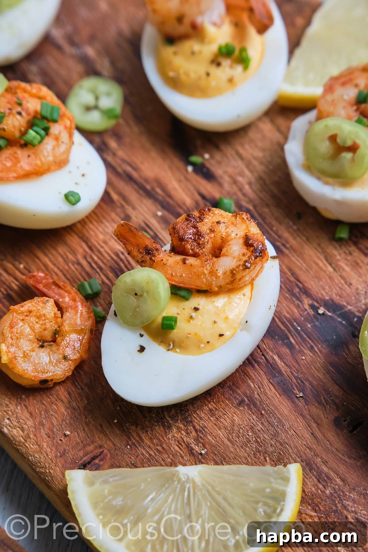 Kickin' Cajun Shrimp Deviled Eggs 6 Close-up of a deviled egg topped with shrimp.