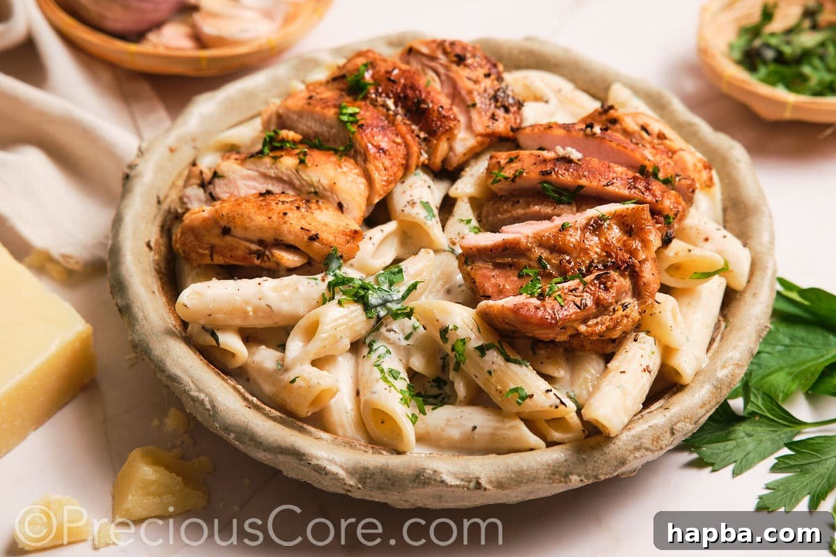 Velvety One-Pan Chicken Pasta 19 Creamy pasta topped with sliced boneless chicken thighs.