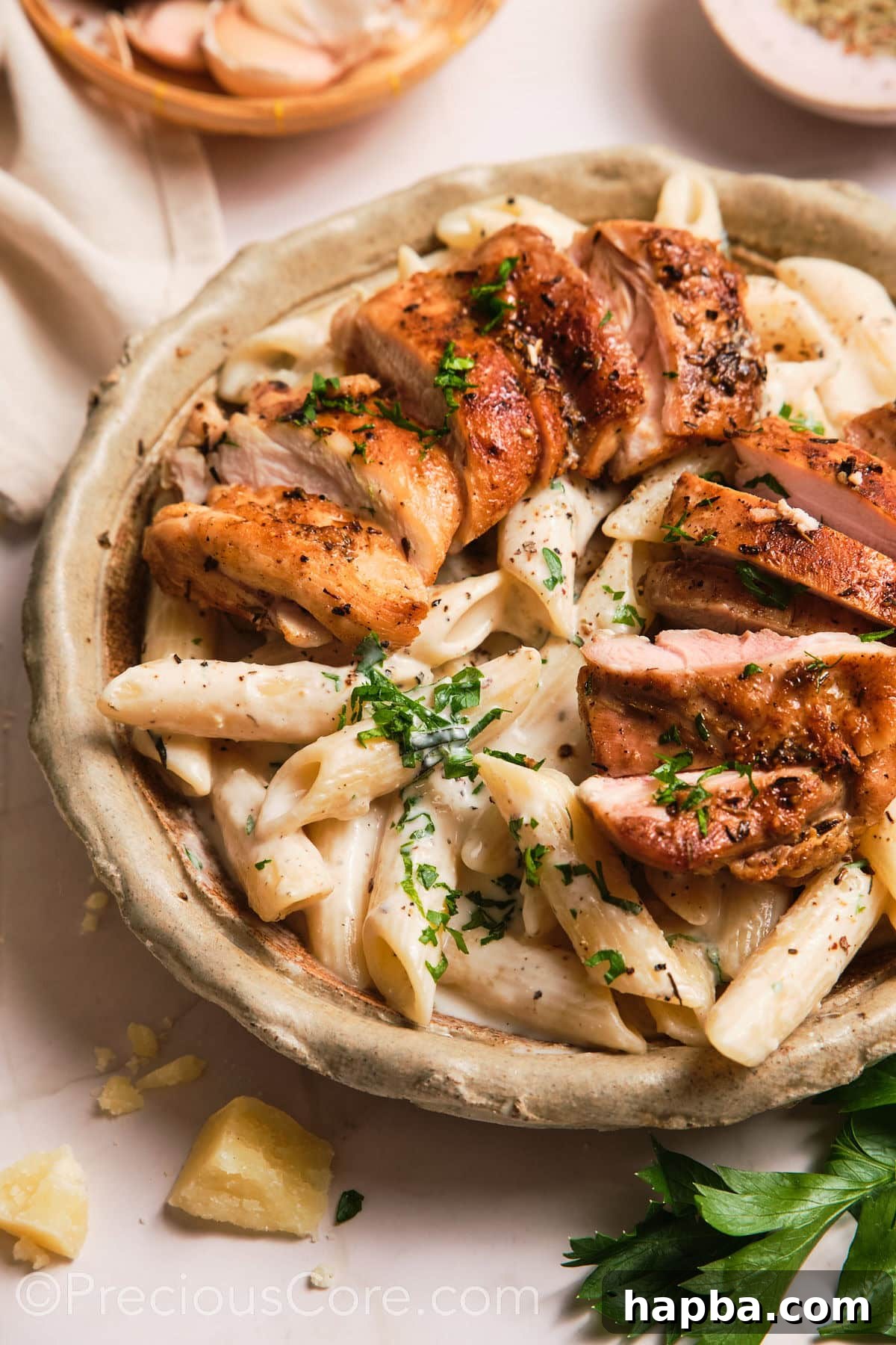 Velvety One-Pan Chicken Pasta 5 Close-up shot of a bowl of creamy pasta.