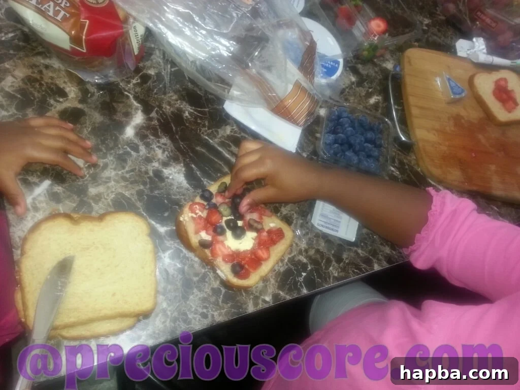 A healthy and colorful fruit sandwich, prepared by a child for breakfast.