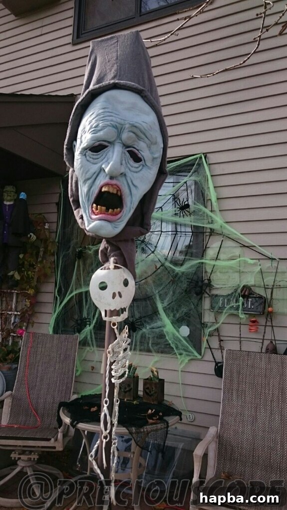 Spooky Photo Roundup 5 Close up of Halloween decorations, possibly a grave scene with a skeleton hand.