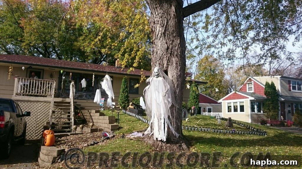 Spooky Photo Roundup 7 A brightly lit Halloween display featuring pumpkins and other festive elements.