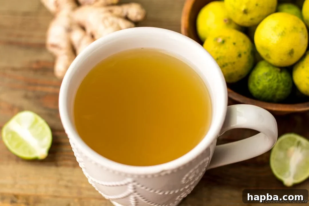 Landscape image of a mug of ginger tea, steam rising, conveying warmth and tranquility.