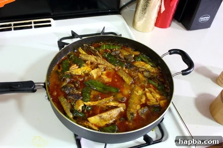 A large pot filled with cooked Ekwang, steaming and ready to be served.