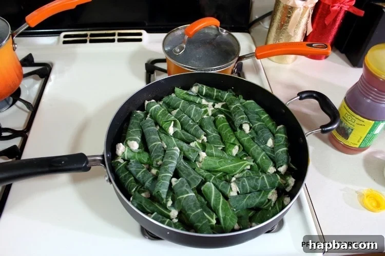 Cocoyam paste parcels neatly arranged in a skillet, ready for cooking.
