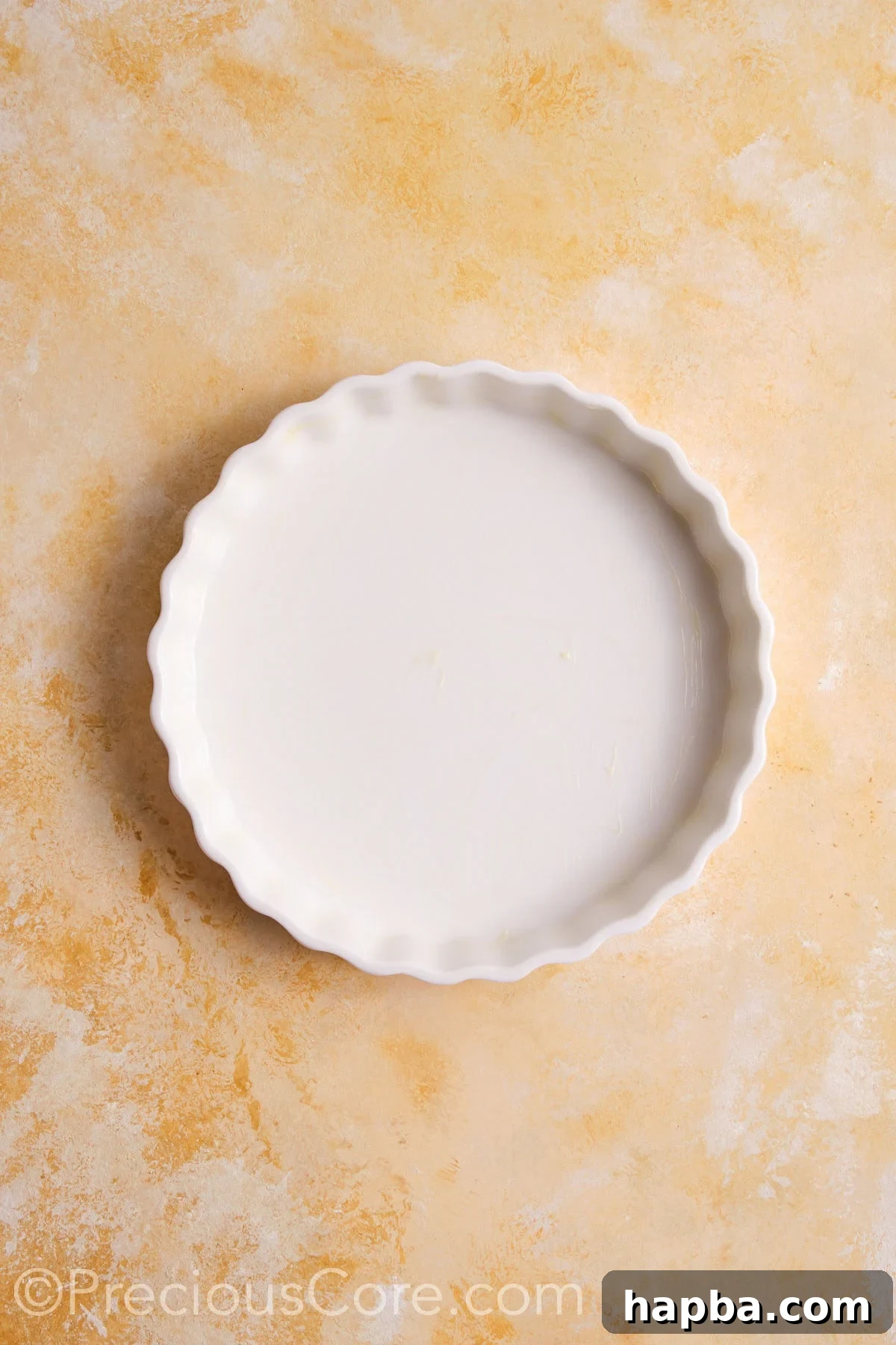 A greased pie dish.