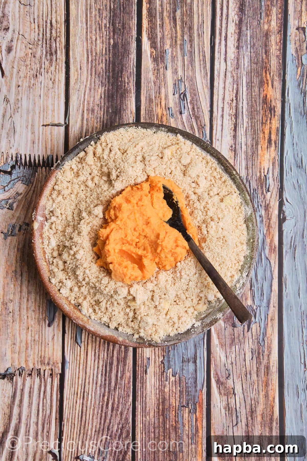 Golden Sweet Potato Scones 11 The sweet potato and liquid mixture being poured into the dry ingredients.