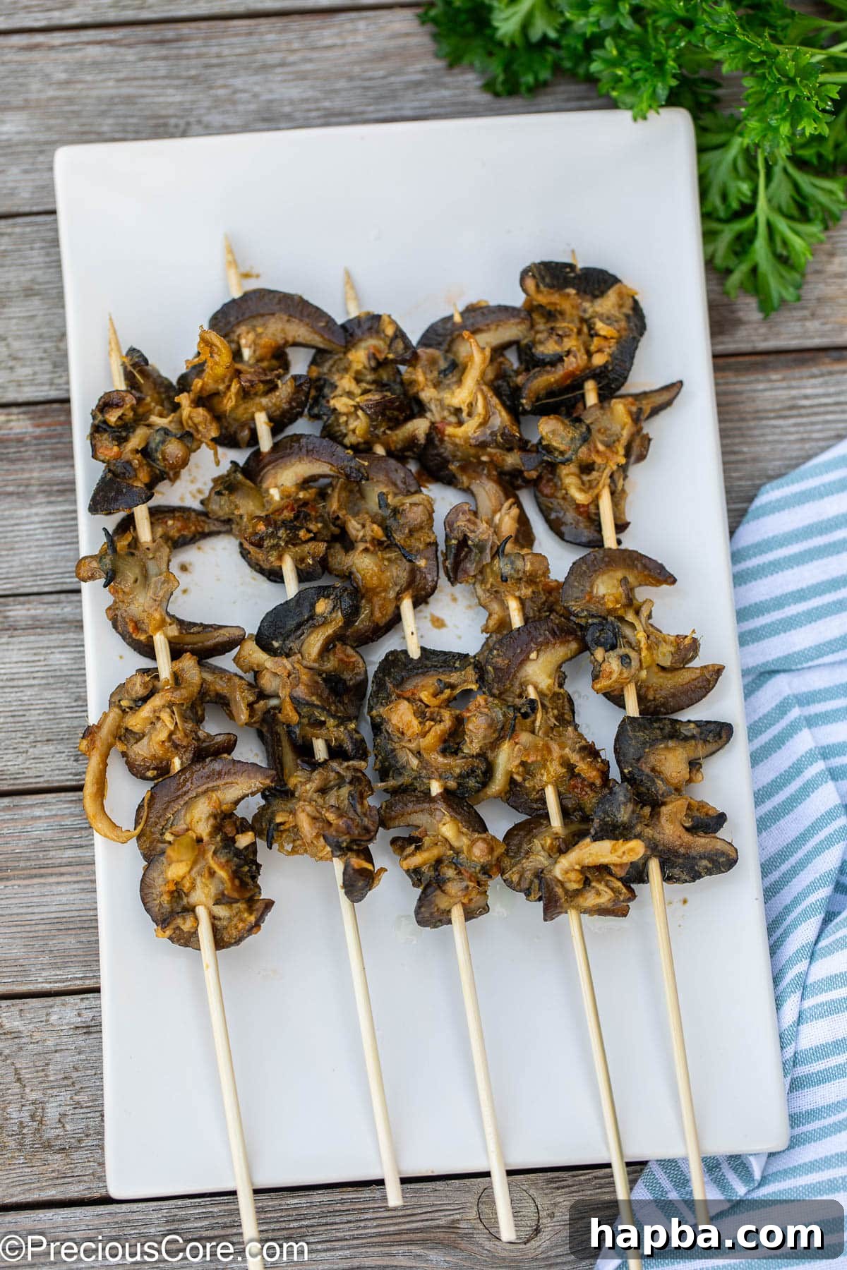 Authentic Cameroonian Snail Dish 4 Cameroonian street food snails threaded on Bamboo skewers.