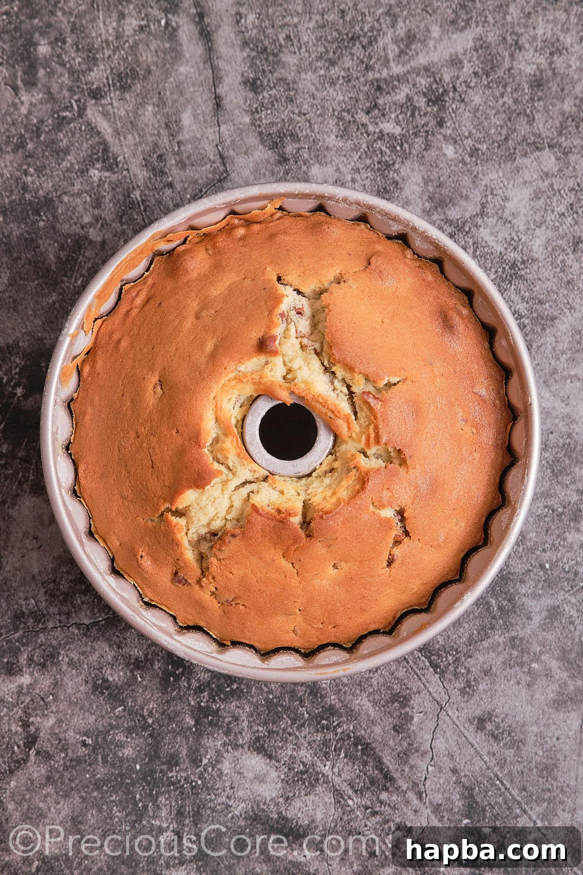 Decadent Butter Pecan Pound Cake 12 The Bundt cake baking in the oven, reaching a beautiful golden-brown color.