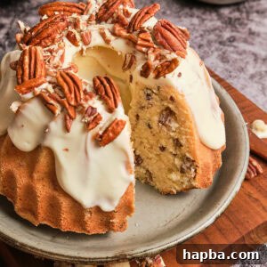 Decadent Butter Pecan Pound Cake 20 Butter pecan pound cake with a slice taken out.