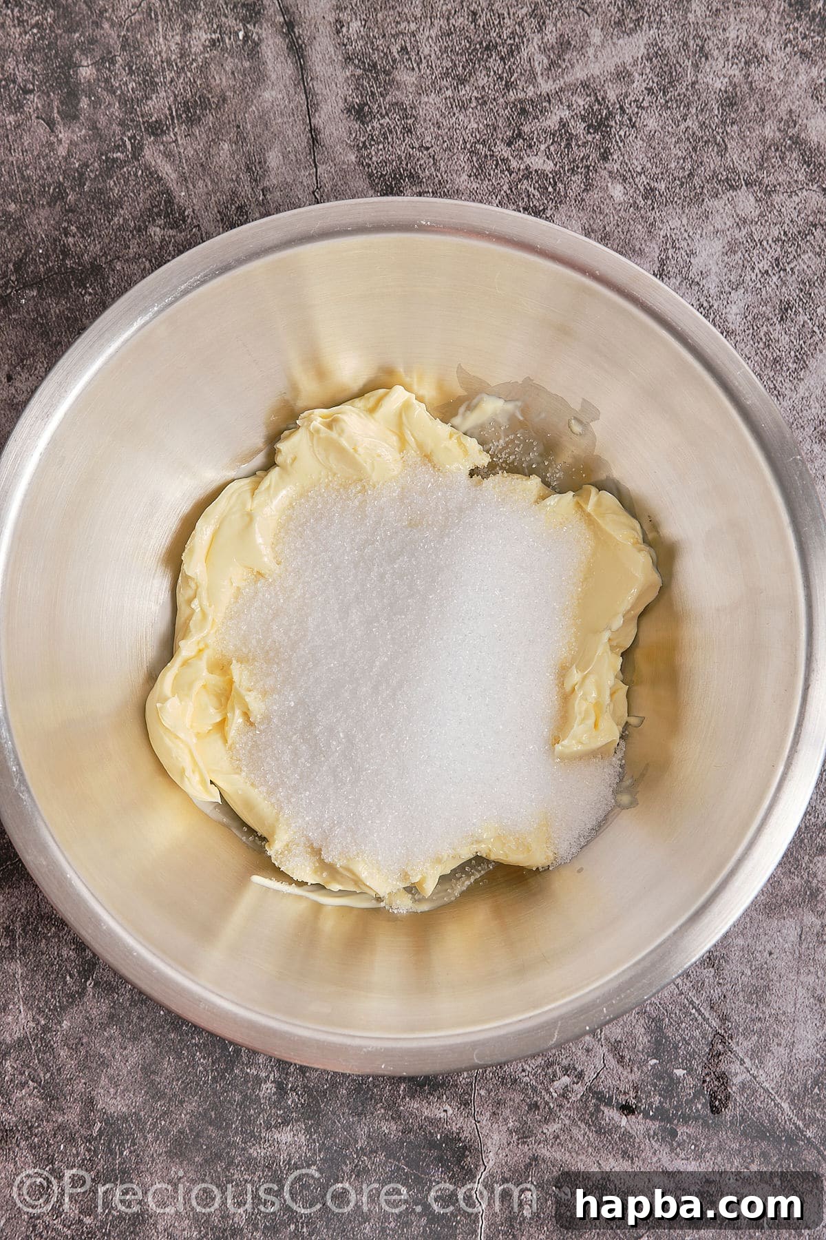 Decadent Butter Pecan Pound Cake 6 Creaming butter and sugar together in a large mixing bowl until light and fluffy.
