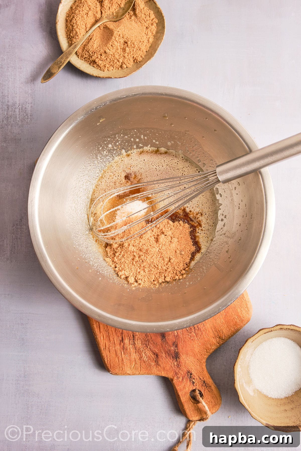 Adding brown sugar to the brown butter mixture. 