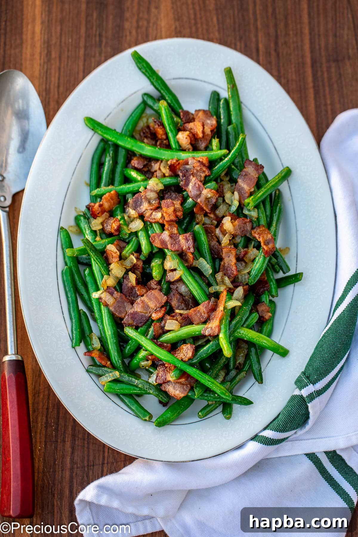 A serving of bacon green beans in a bowl, showcasing the dish's appeal.