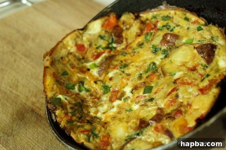 A whole frittata carefully removed from the pan.