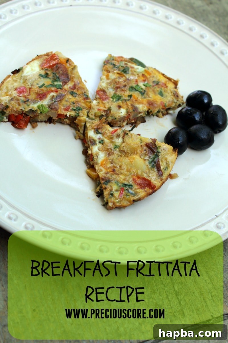 Close-up of a frittata slice, showing the eggs and vegetables.