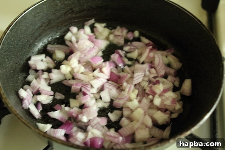 Sautéed onions in a cast iron skillet.